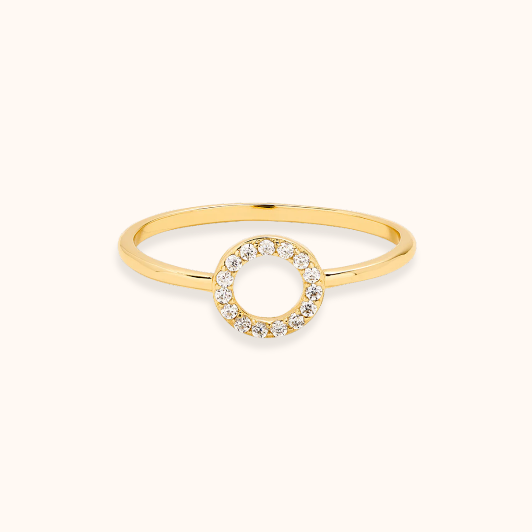 Delicate pave diamond circle ring in yellow gold